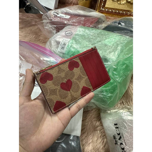 ORIG & IMPORTED CCH Zip Card Case In Signature Canvas With Heart Print Brown Wallet