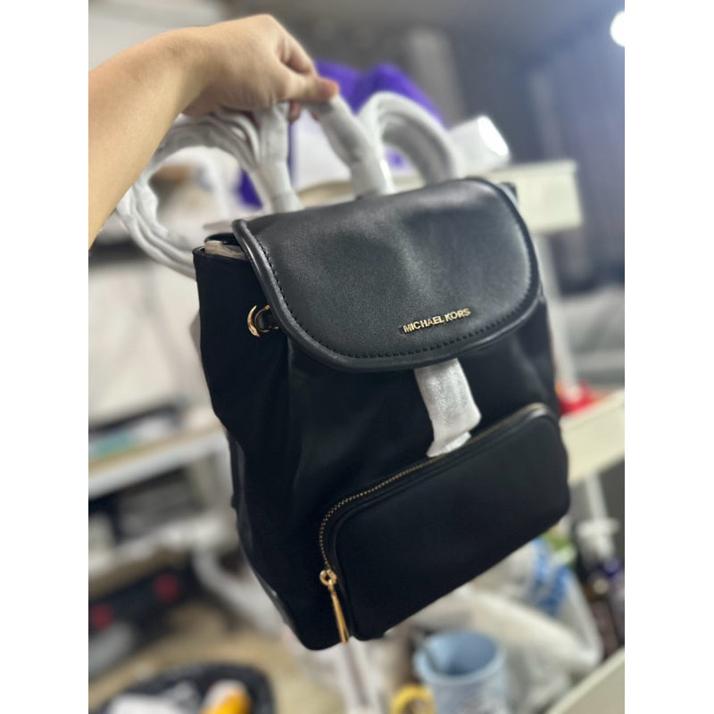 ORIG & IMPORTED with flaw MK Cara Small Nylon Backpack Black Bag