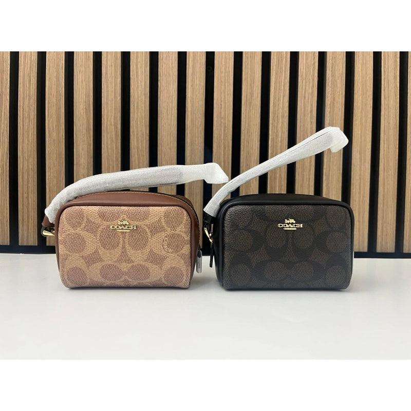 ORIG & IMPORTED CCH Pouch Wristlet Wallet In Signature Canvas