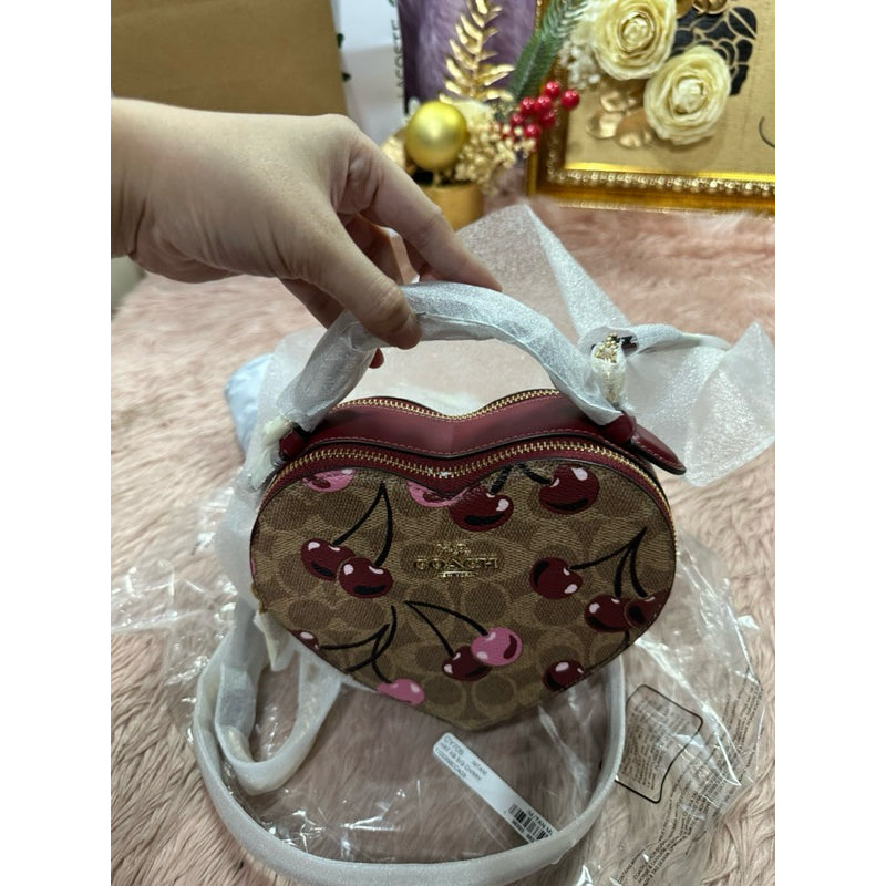 ORIG & IMPORTED CCH Heart Crossbody Bag In Signature Canvas With Cherry Print Brown Bag
