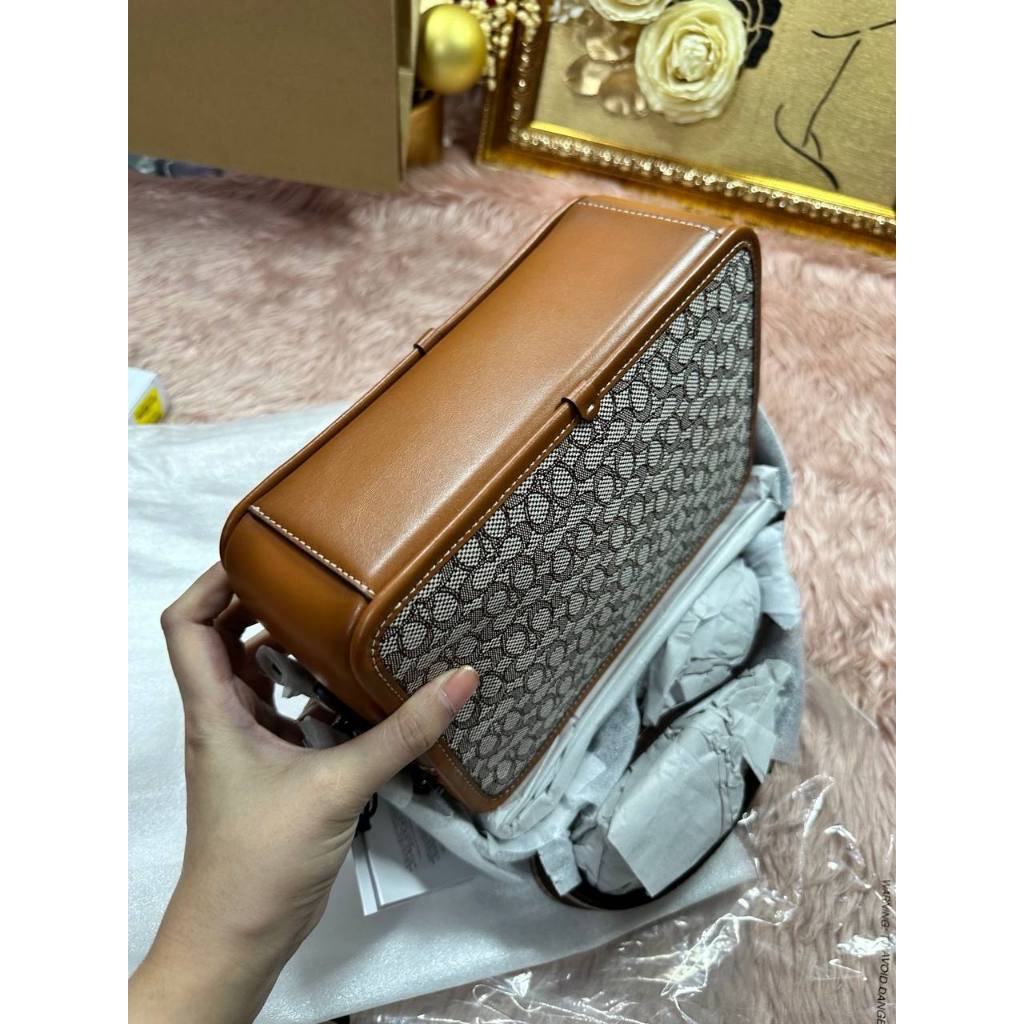ORIG CCH RETAIL CHARTER CROSSBODY 24 IN MICRO SIGNATURE JACQUARD BROWN