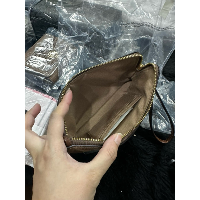 ORIG & IMPORTED CCH Large Corner Zip Wristlet Phone Wallet In Signature Canvas Brown/Khaki