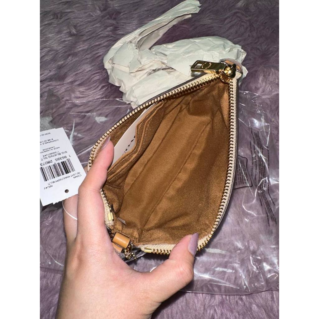 ORIG & IMPORTED CCH Nolita 19 In Signature Canvas Khaki Brown Small Kilikili Bag