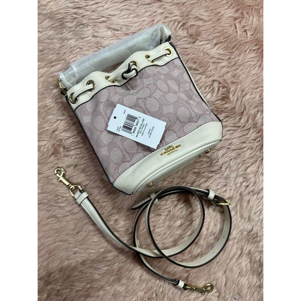 ORIG & IMPORTED CCH Dempsey Drawstring Bucket Pink Small Bag 15 in Signature Jacquard