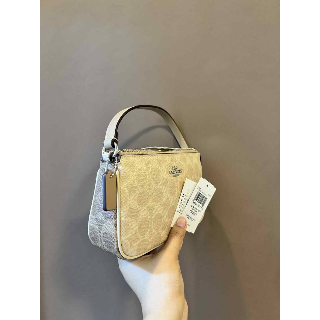 ORIG & IMPORTED CCH Nolita 19 In Signature Canvas Sand/Taupe Small Kilikili Bag