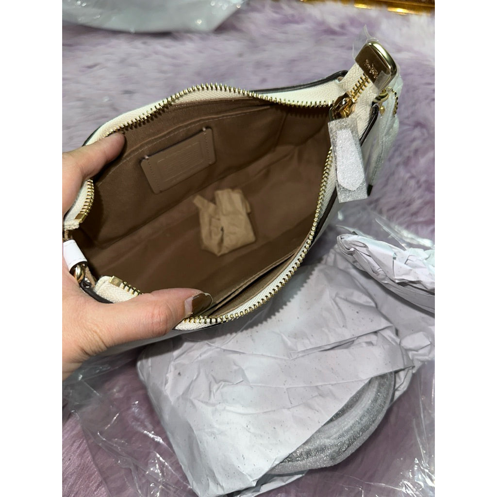 ORIG & IMPORTED CCH Teri Shoulder Bag In Signature Canvas Glacier White