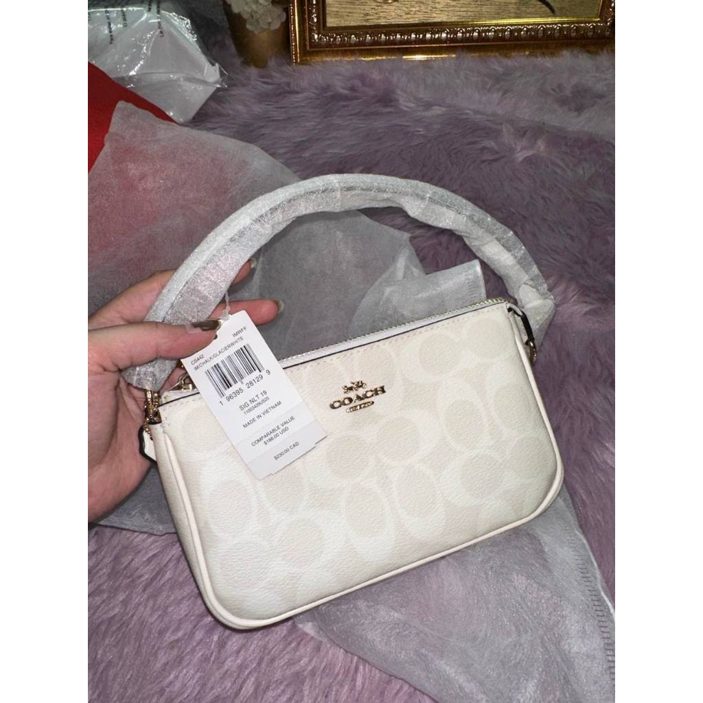 ORIG & IMPORTED CCH Nolita 19 In Signature Canvas Glacier White Small Kilikili Bag