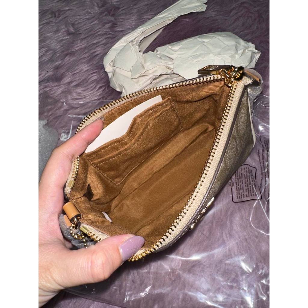 ORIG & IMPORTED CCH Nolita 19 In Signature Canvas Khaki Brown Small Kilikili Bag