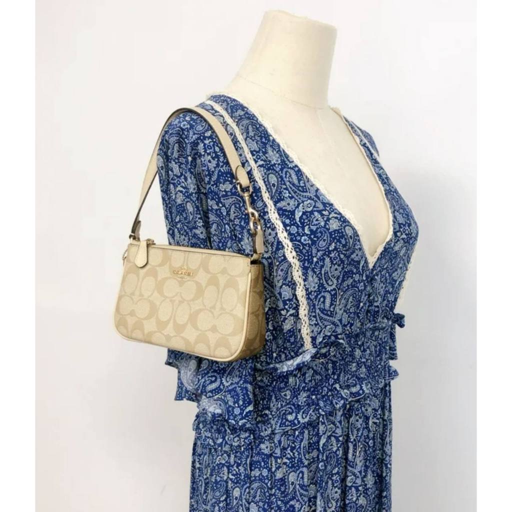 ORIG & IMPORTED CCH Nolita 19 In Signature Canvas Khaki Brown Small Kilikili Bag