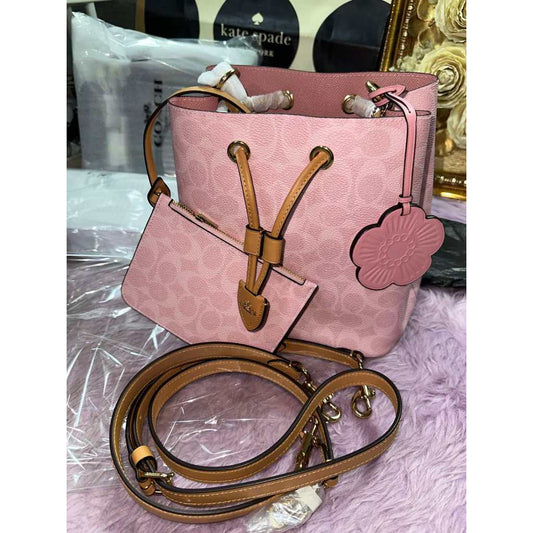 ORIG & IMPORTED CCH RARE Rowan Pink Bucket Bag In Signature Canvas