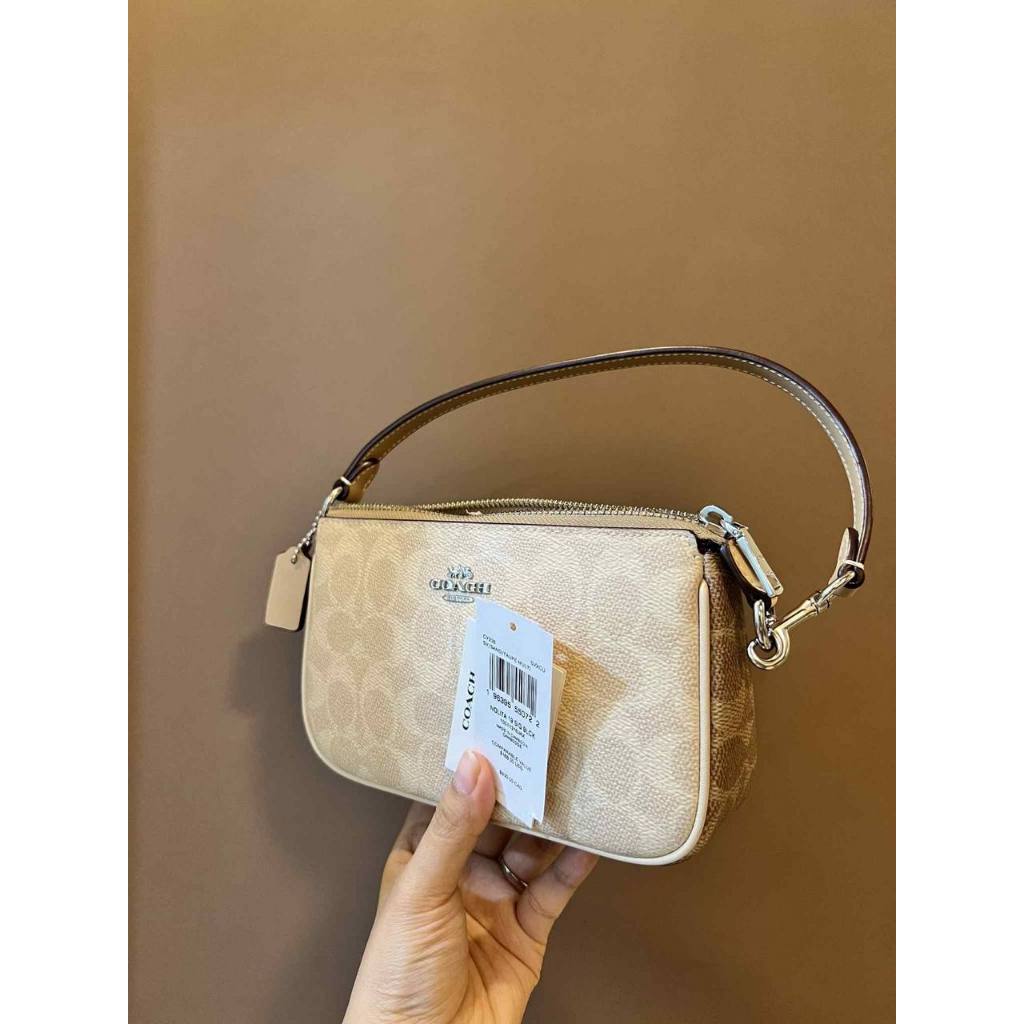 ORIG & IMPORTED CCH Nolita 19 In Signature Canvas Sand/Taupe Small Kilikili Bag
