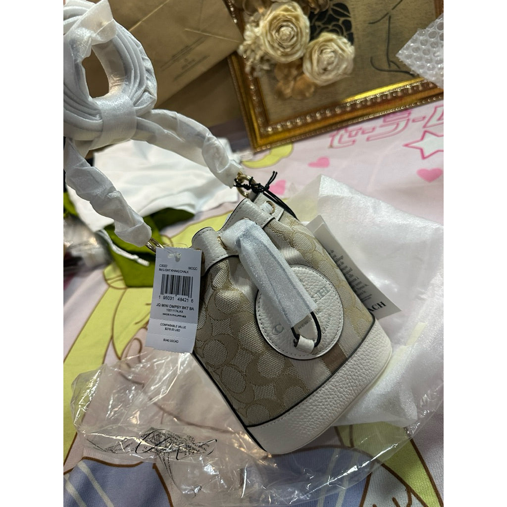 ORIG & IMPORTED CCH MINI DEMPSEY BUCKET WHITE BAG IN SIGNATURE JACQUARD