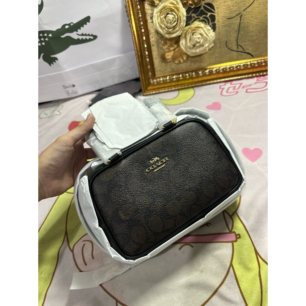 ORIG & IMPORTED CCH Top Handle Crossbody Bag In Signature Canvas Walnut/Brown