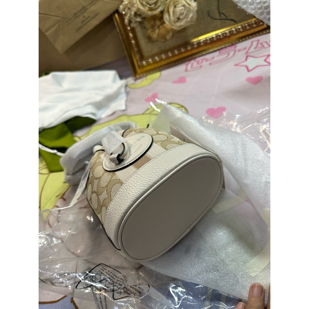 ORIG & IMPORTED CCH MINI DEMPSEY BUCKET WHITE BAG IN SIGNATURE JACQUARD