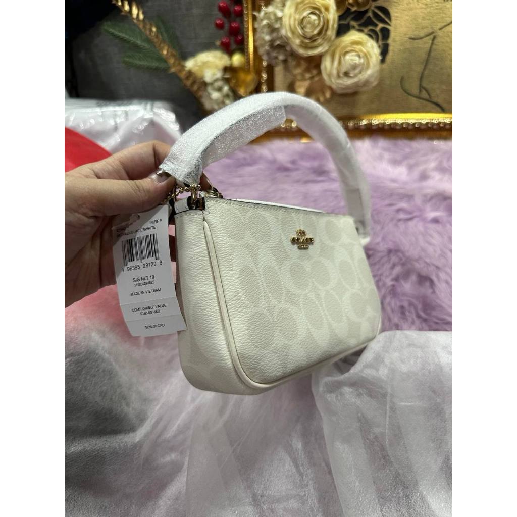 ORIG & IMPORTED CCH Nolita 19 In Signature Canvas Glacier White Small Kilikili Bag