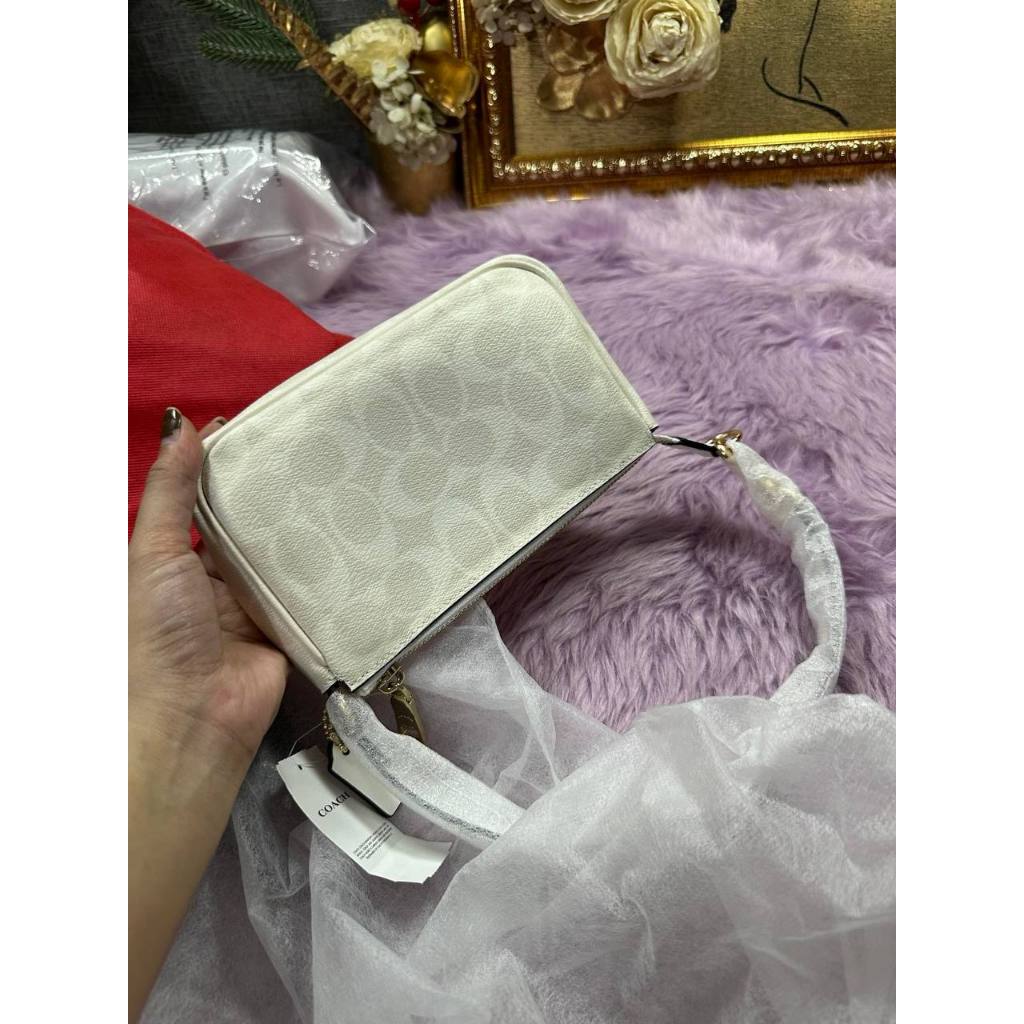 ORIG & IMPORTED CCH Nolita 19 In Signature Canvas Glacier White Small Kilikili Bag