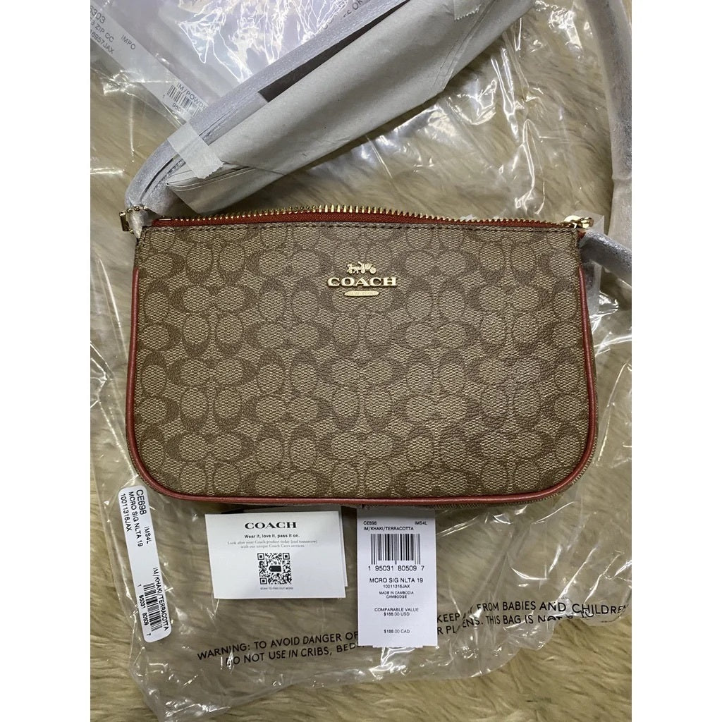 ORIG & IMPORTED CCH Nolita 19 In Colorblock Signature Canvas Kilikili Bag in Khaki Brown