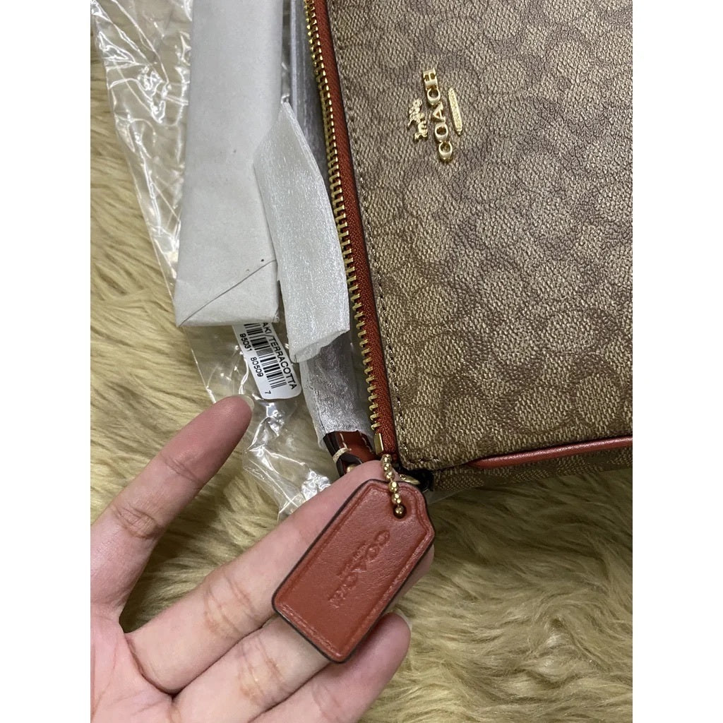 ORIG & IMPORTED CCH Nolita 19 In Colorblock Signature Canvas Kilikili Bag in Khaki Brown