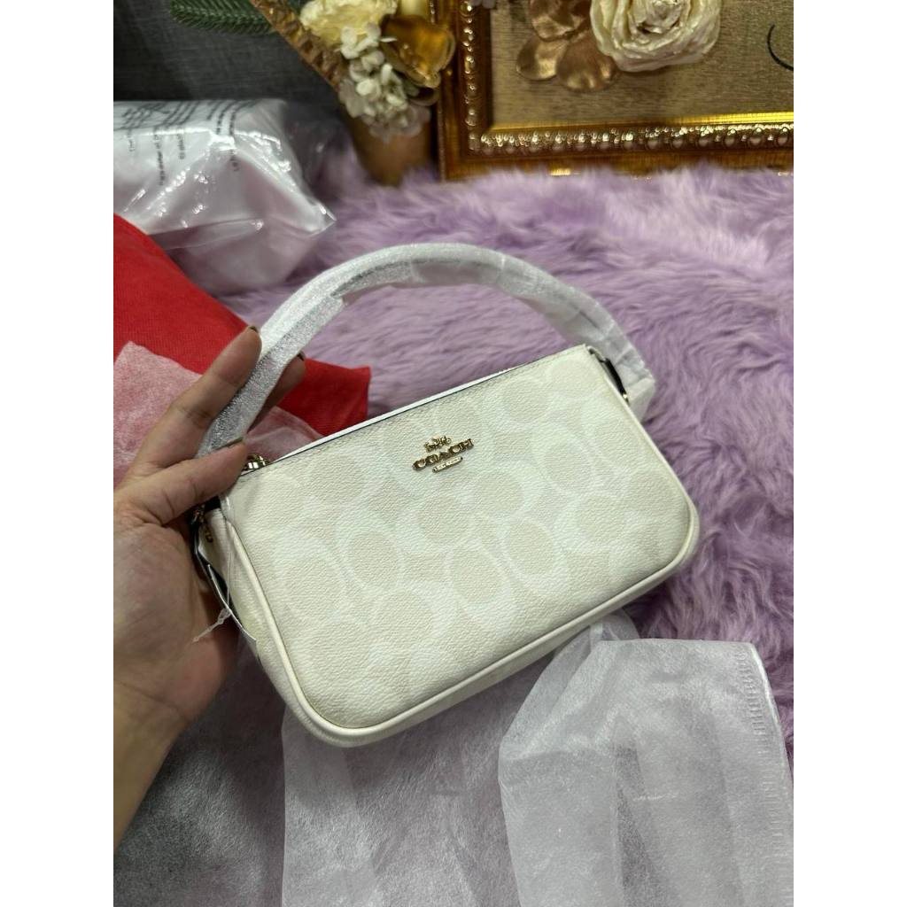ORIG & IMPORTED CCH Nolita 19 In Signature Canvas Glacier White Small Kilikili Bag