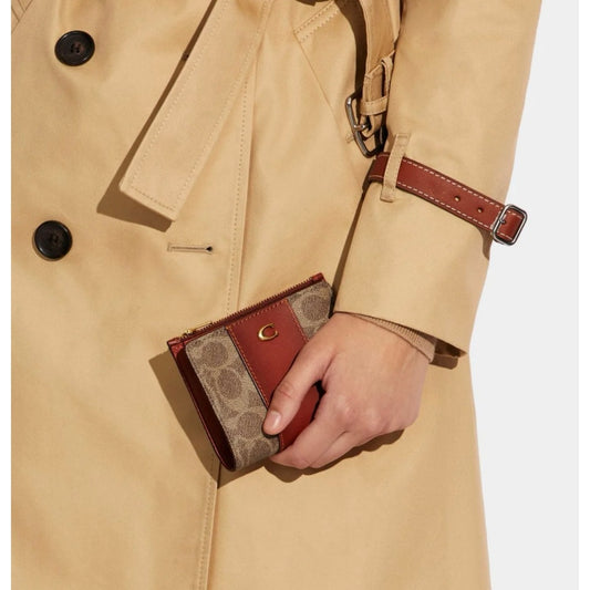 ORIG & IMPORTED Retail CCH Bifold Snap Brown Wallet In Signature Canvas