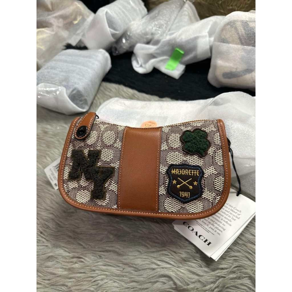 ORIG & IMPORTED CCH Retail Swinger 20 In Signature Jacquard With Varsity Patches Small Brown Bag