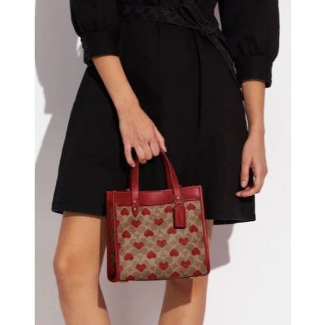 ORIG & IMPORTED Preloved CCH Retail Field Tote 22 With Heart Print Brown Bag