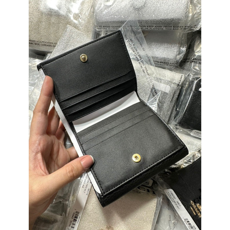 ORIG & IMPORTED C0@CH Georgie Small Wallet In Blocked Signature Canvas