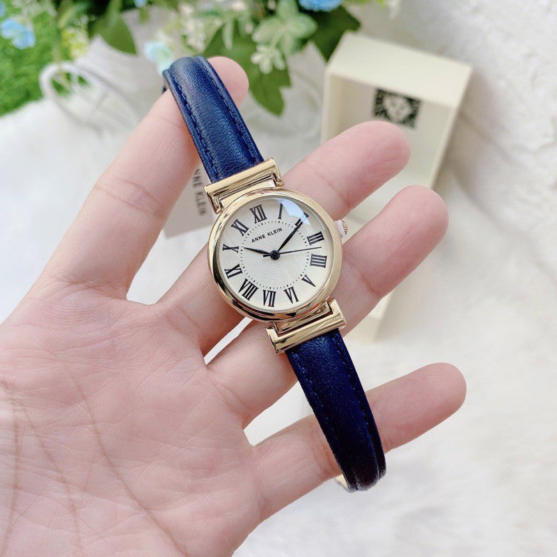 ORIG & IMPORTED AK Klein AK/2246CRNV Gold-Tone and Navy Blue Leather Strap Watch