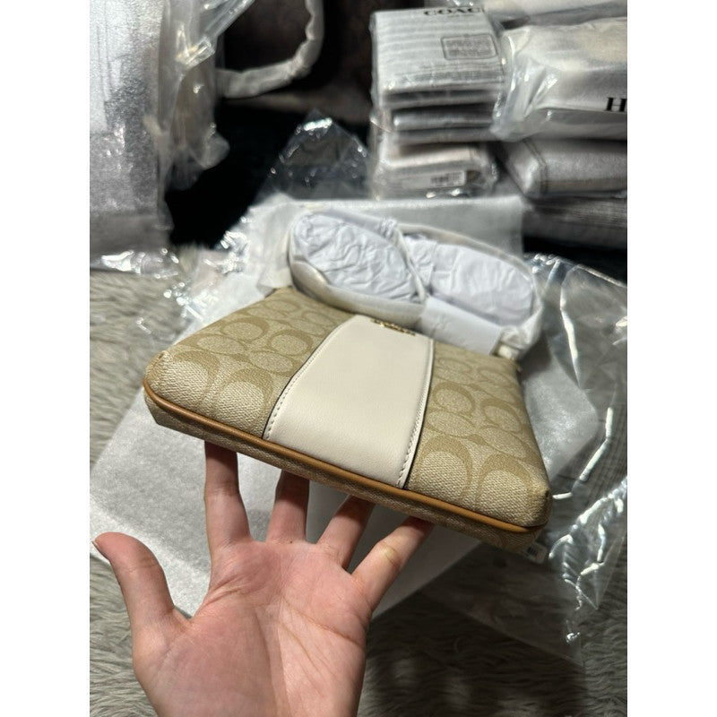 ORIG & IMPORTED CCH Mini Rowan File Bag In White Signature Canvas With Stripe