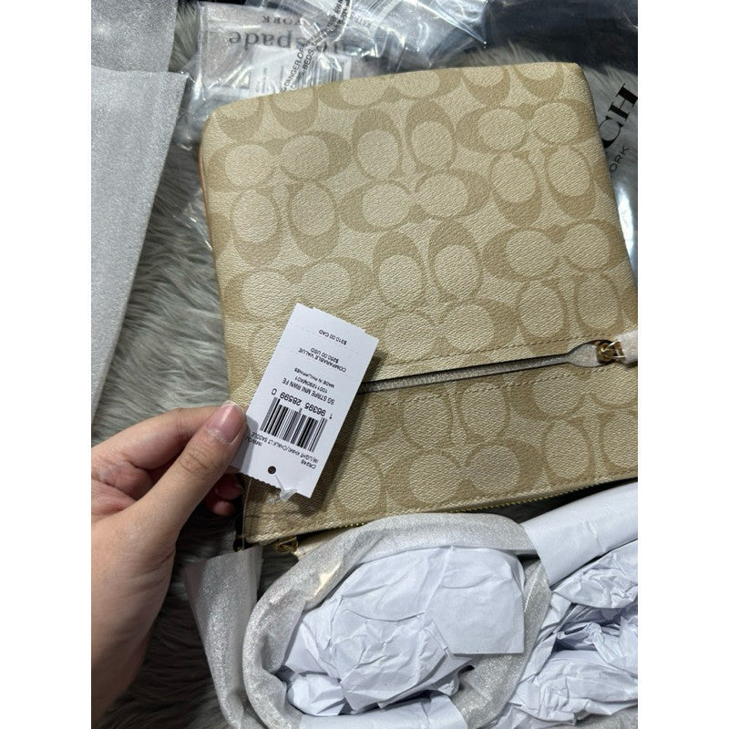 ORIG & IMPORTED CCH Mini Rowan File Bag In White Signature Canvas With Stripe