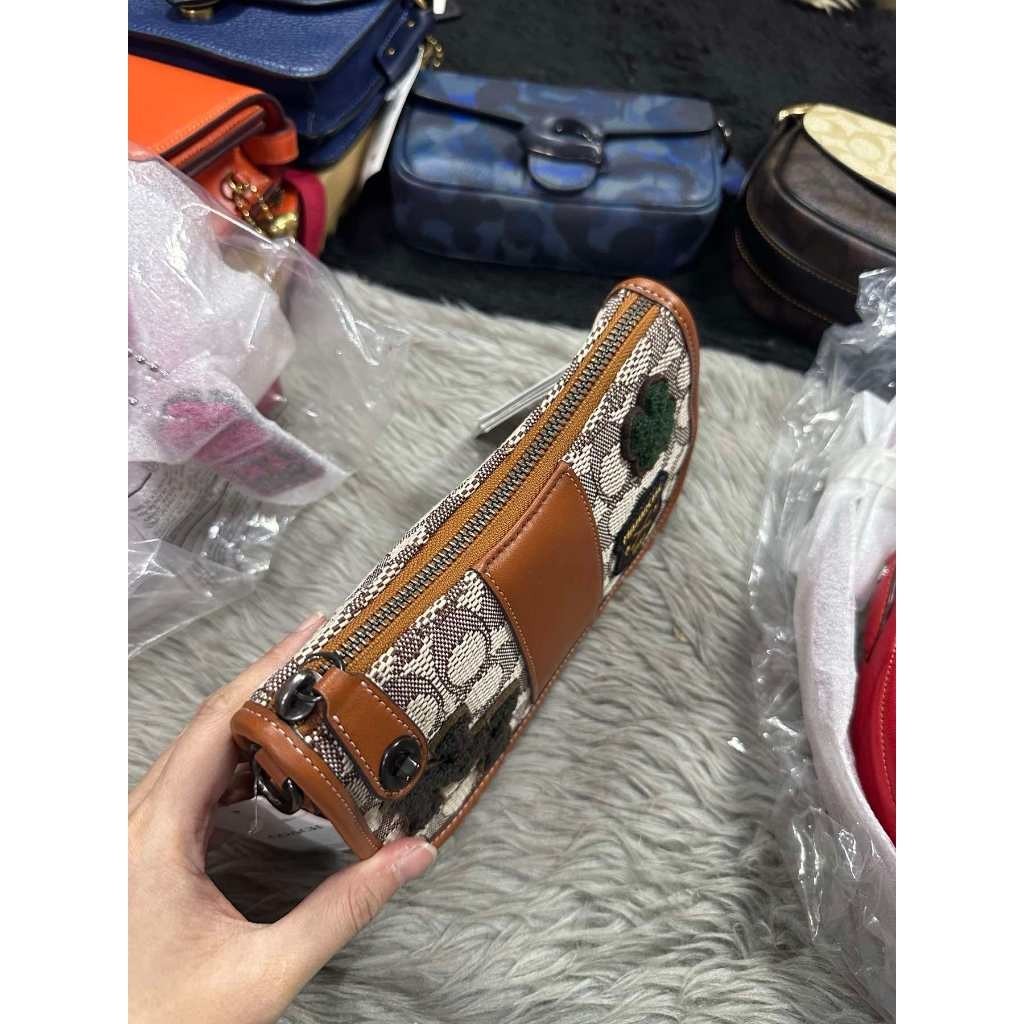 ORIG & IMPORTED CCH Retail Swinger 20 In Signature Jacquard With Varsity Patches Small Brown Bag