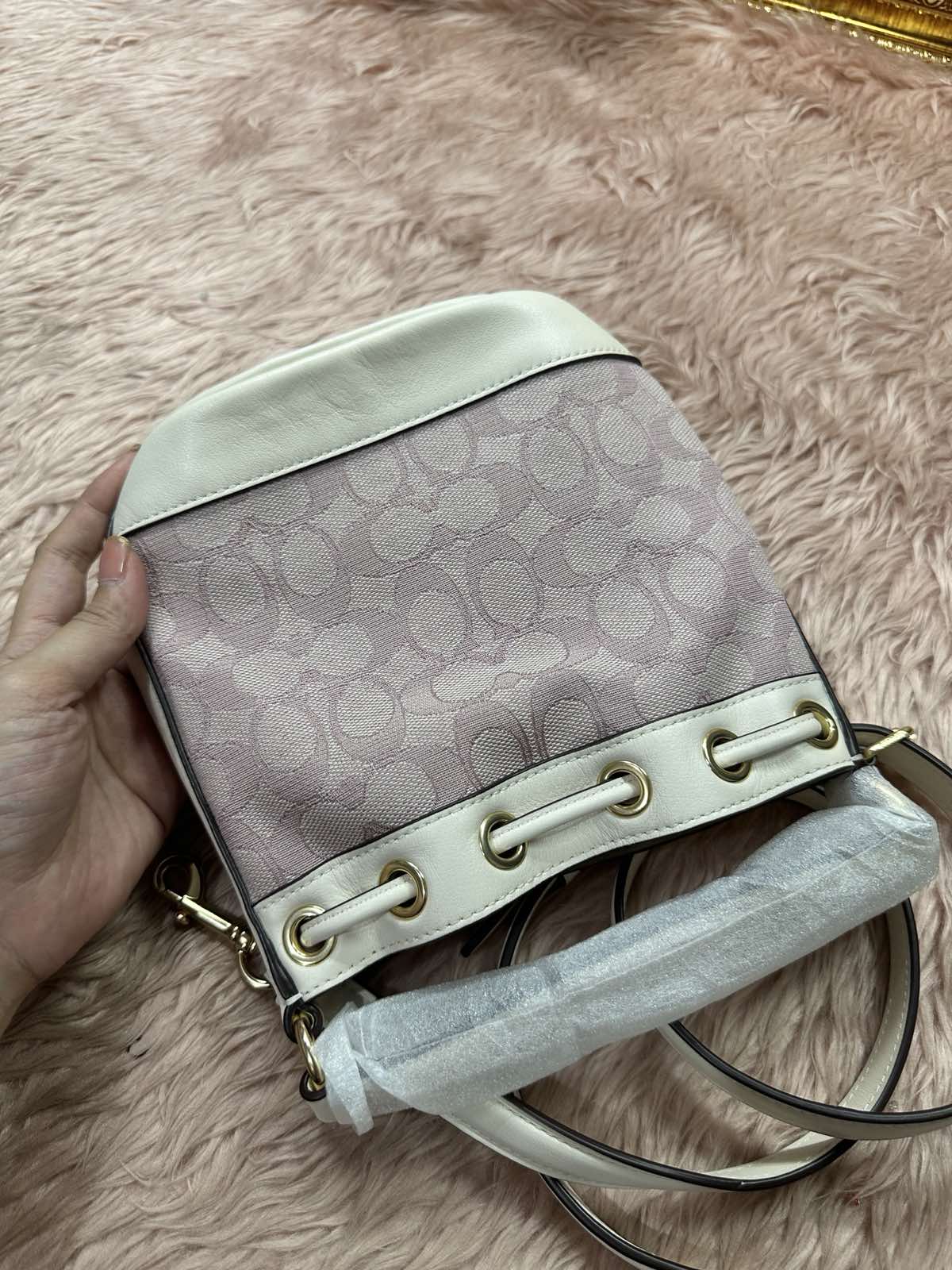 ORIG & IMPORTED COACH Dempsey Drawstring Bucket Pink Small Bag 15 in Signature Jacquard