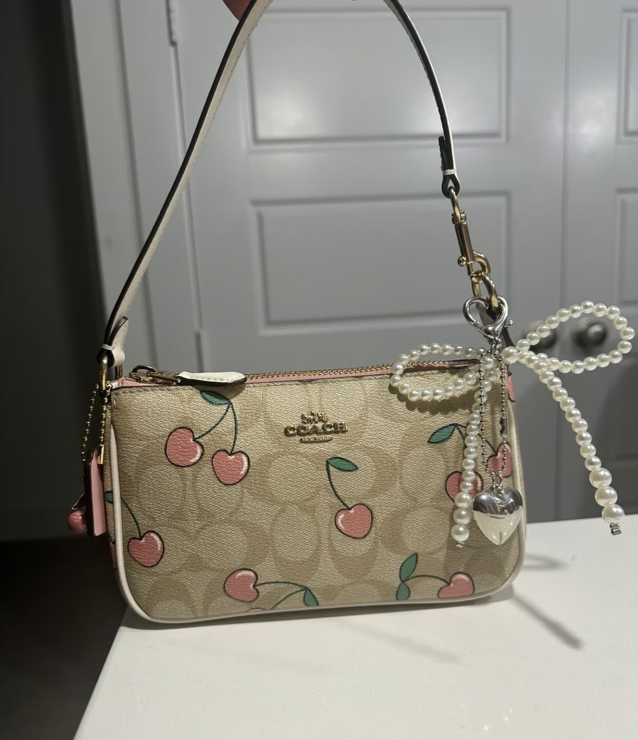 ORIG & IMPORTED Coach Nolita 19 with Cherry Print in Light Khaki Small Bag