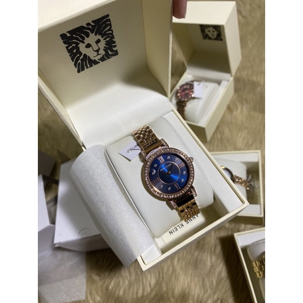 AUTHENTIC Anne Klein Women's Premium Crystal Accented Bracelet Watch (Model: AK/2928NVRG)
