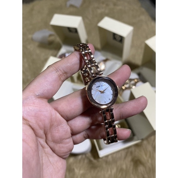 AUTHENTIC Anne Klein Women's AK/3120MPRG Premium Crystal Accented Rose Gold-Tone Open Bracelet Watch