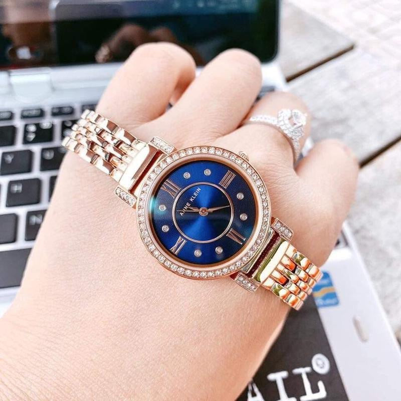 AUTHENTIC Anne Klein Women's Premium Crystal Accented Bracelet Watch (Model: AK/2928NVRG)