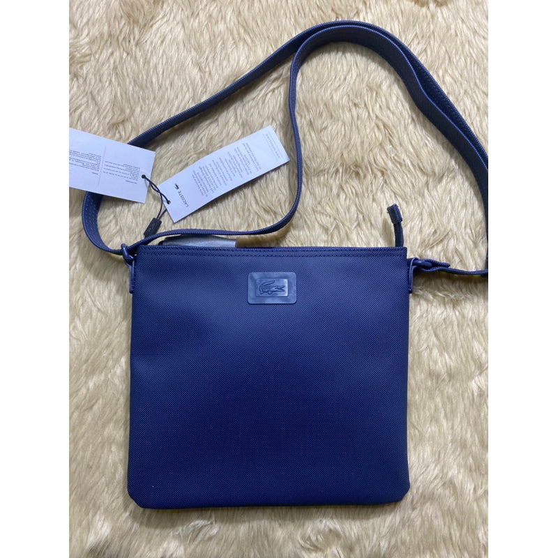 AUTHENTIC/ORIGINAL Lacoste Flat Crossbody Bag in Blue/Peacote