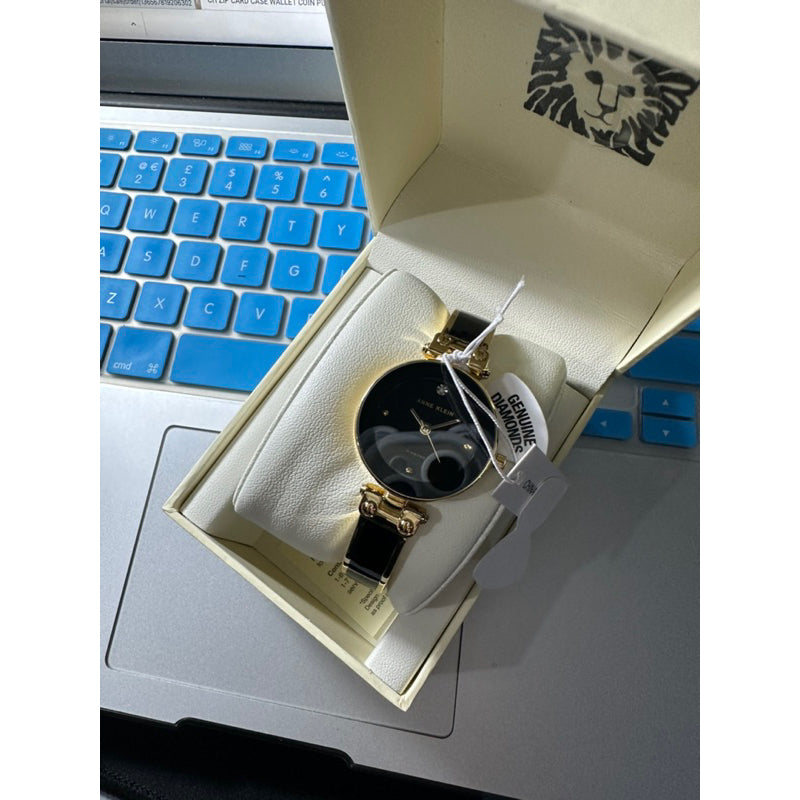 AUTHENTIC/ORIGINAL Anne Klein Women's Genuine Diamond Dial Bangle Watch AK/1980BKGB