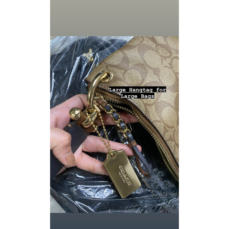 Large Coach store Clutch & Keychain