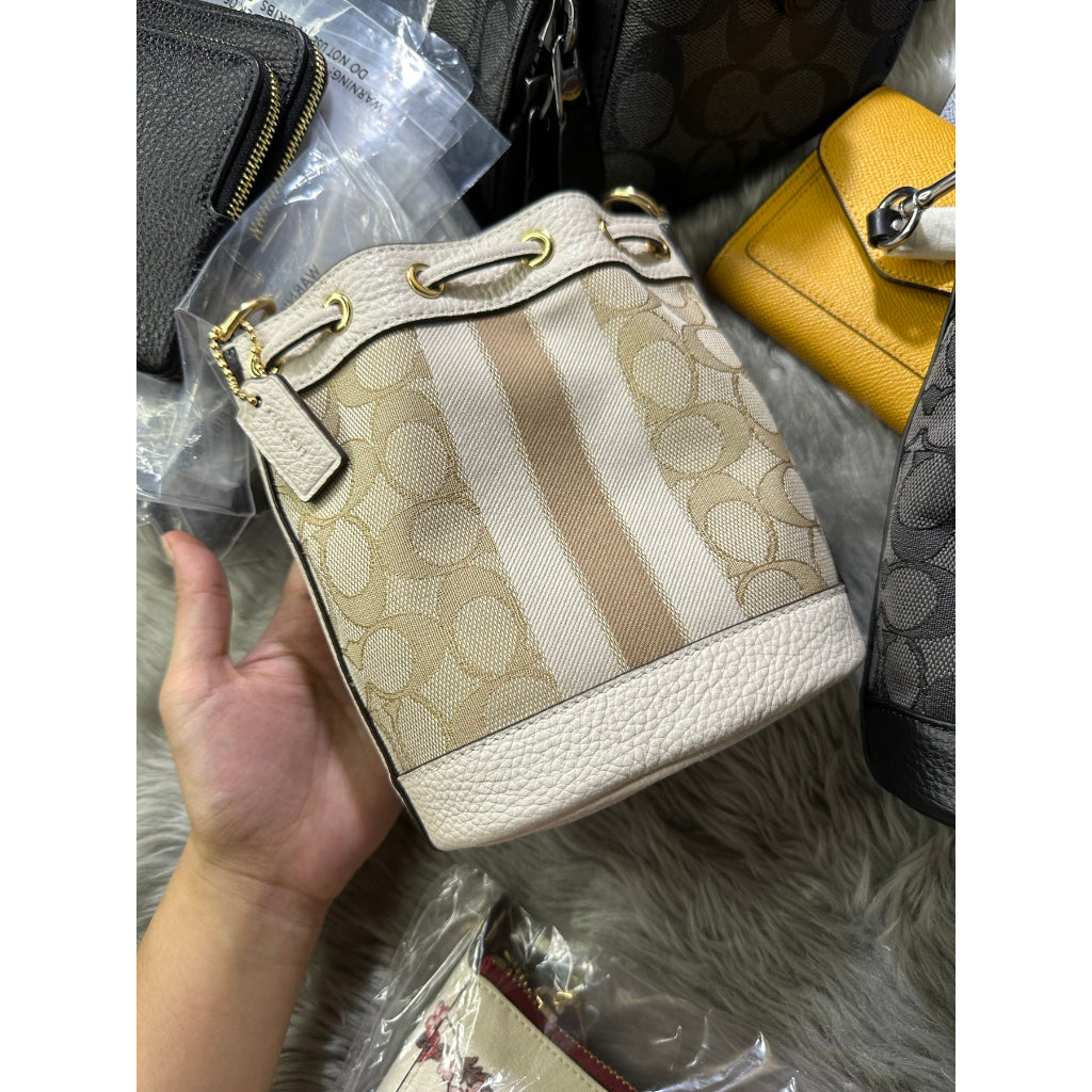 AUTHENTIC/ORIGINAL Coach Mini Dempsey Bucket Bag in Signature Jacquard White