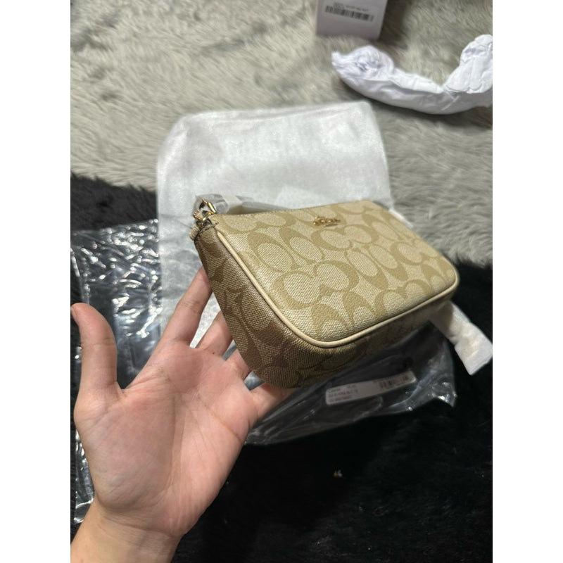 Coach sling bag original price best sale