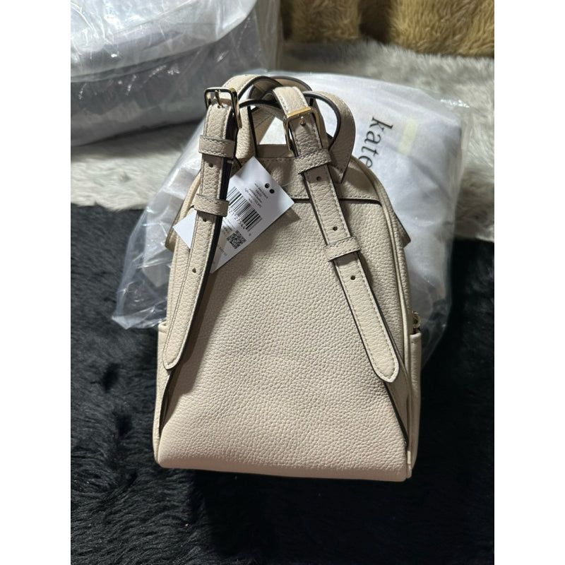 AUTHENTIC/ORIGINAL KateSpade Leila Pebbled Leather Mini Dome Backpack Bag in Light Sand/White