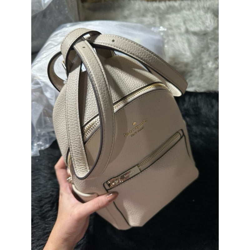 AUTHENTIC/ORIGINAL KateSpade Leila Pebbled Leather Mini Dome Backpack Bag in Light Sand/White