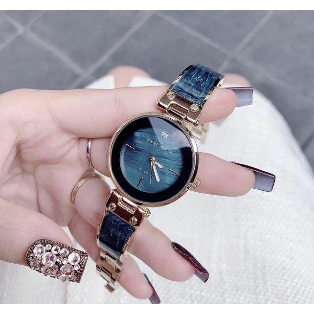 AUTHENTIC/ORIGINAL Anne Klein Women's AK/2512NVGB Diamond-Accented Navy Blue Marbleized Bangle Watch